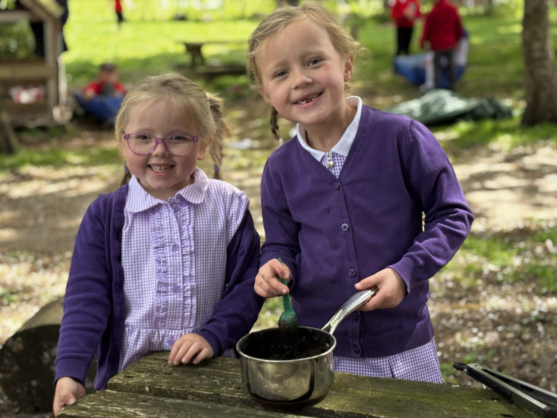 Children in mud kitchen 2