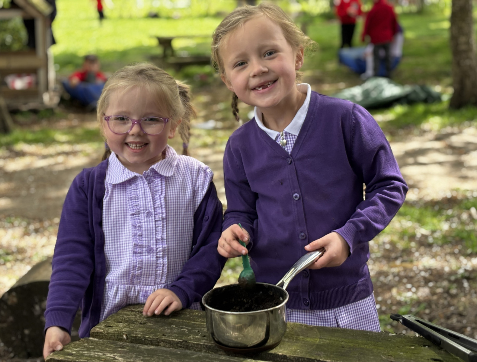 Children in mud kitchen 2