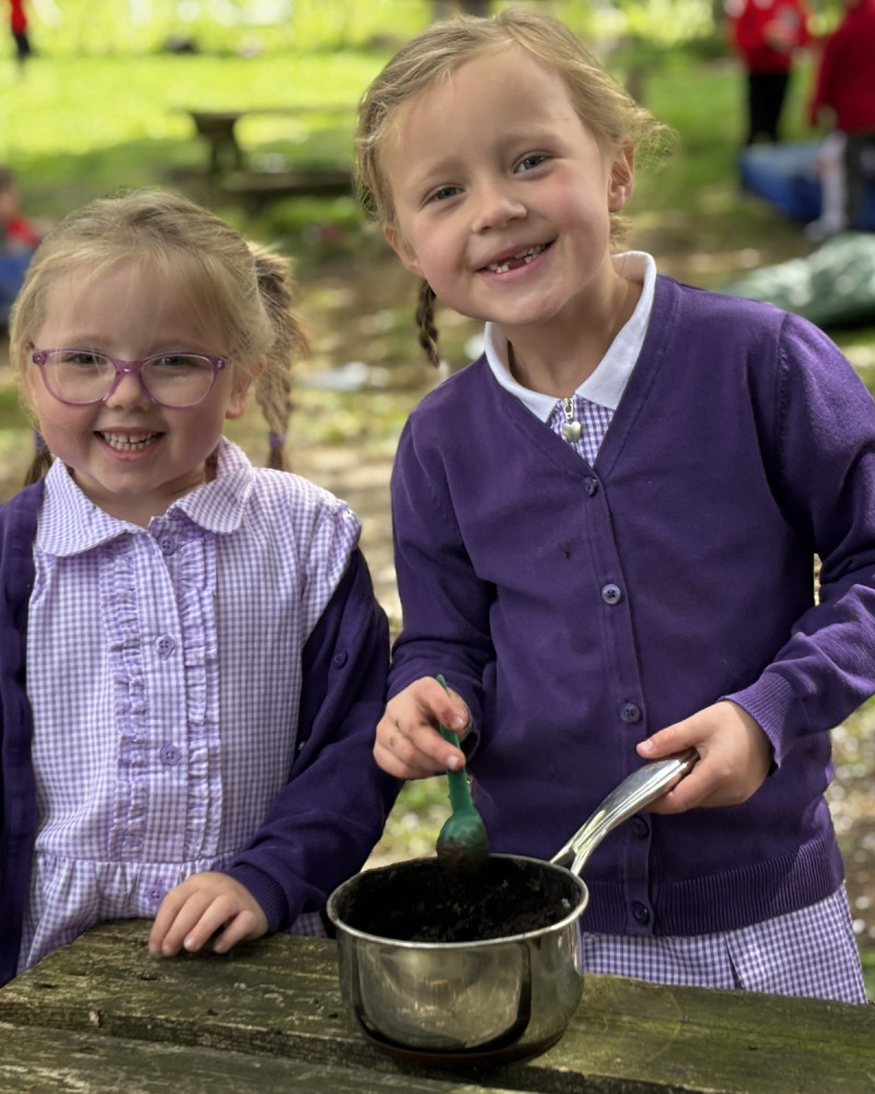 Children in mud kitchen 2